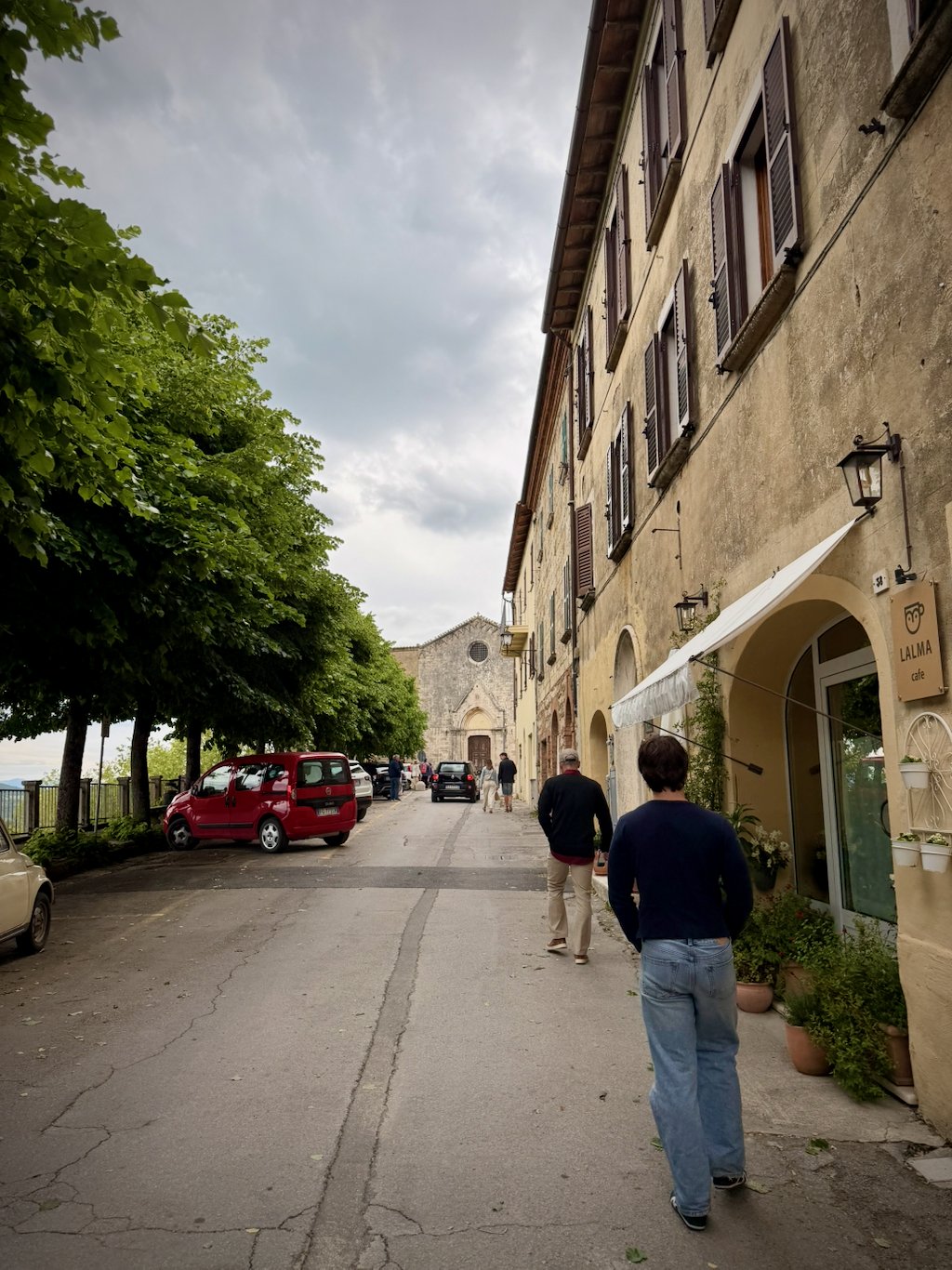 Walking up a quiet street in Montepulciano